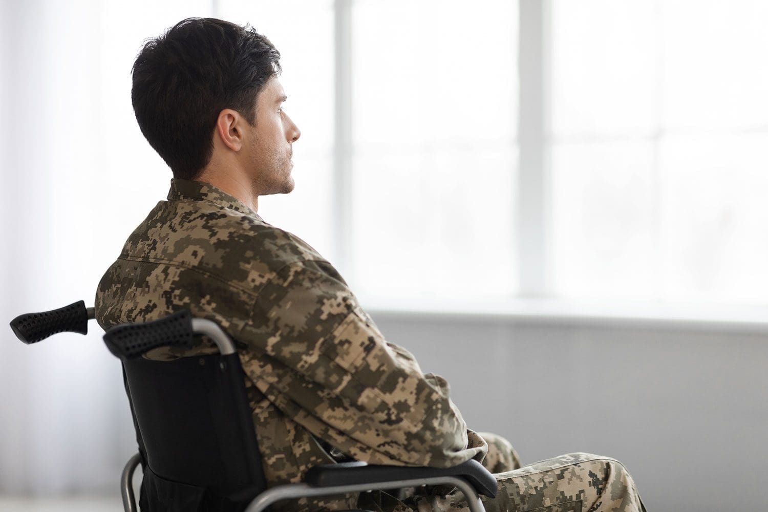 Featured image for free life insurance for 100% disabled Veterans, showing a disabled Veteran sitting in a wheelchair